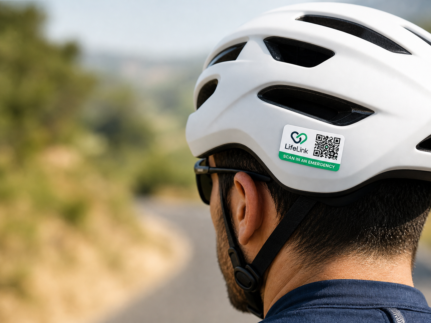 LifeLink emergency QR sticker attached to a cycling helmet